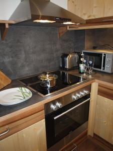Kuchyň nebo kuchyňský kout v ubytování Gästehaus Watzmannblick