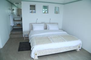 Llit o llits en una habitació de Sky Pavilion