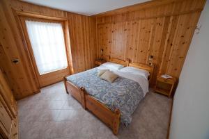 Postel nebo postele na pokoji v ubytování Chalet Bucaneve