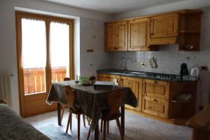 Kuchyň nebo kuchyňský kout v ubytování Chalet Bucaneve