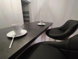 Posedenie v ubytovaní WRN APARTAMENTY