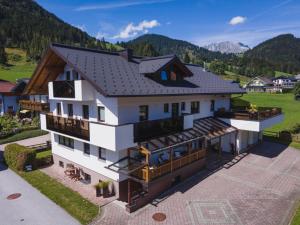 an aerial view of a house with a roof at Ferienwohnung Maria Gstatter in Sankt Martin am Tennengebirge