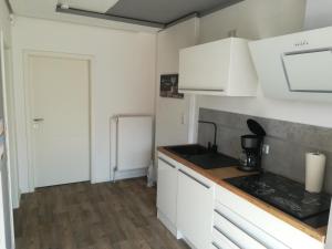 Kuchyň nebo kuchyňský kout v ubytování Ferienhaus Frank Saathoff