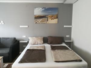 Postel nebo postele na pokoji v ubytování Ferienhaus Frank Saathoff