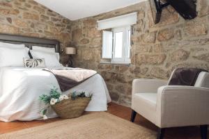 Ένα ή περισσότερα κρεβάτια σε δωμάτιο στο Casa da Nogueira +29 φωτογραφίες