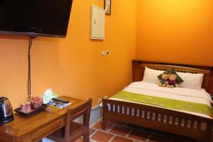 Letto o letti in una camera di PianoPiano B&B
