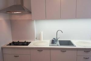 Kuchyňa alebo kuchynka v ubytovaní Apartament Podwale by Your Freedom