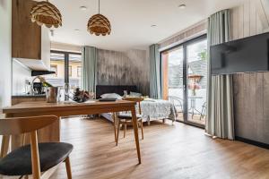Kuchyňa alebo kuchynka v ubytovaní Apartamenty Jedlina