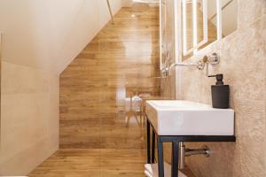 Kúpeľňa v ubytovaní Apartamenty Jedlina