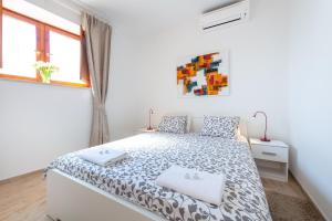 Posteľ alebo postele v izbe v ubytovaní Romance Apartments Dubrovnik