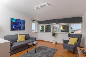 Televízia a/alebo spoločenská miestnosť v ubytovaní Romance Apartments Dubrovnik