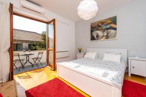 Posteľ alebo postele v izbe v ubytovaní Romance Apartments Dubrovnik