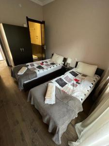 Кровать или кровати в номере Guesthouse Mestia 32