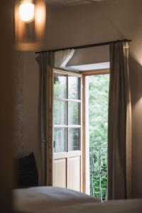 A bed or beds in a room at Autentis