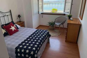 Łóżko lub łóżka w pokoju w obiekcie apartamento plaza del parque