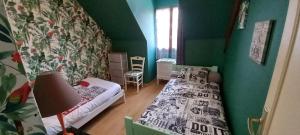 Postel nebo postele na pokoji v ubytování Chez Patrick + 27 fotografií