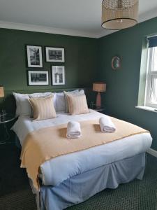 Posteľ alebo postele v izbe v ubytovaní Old Ship Inn Hackney