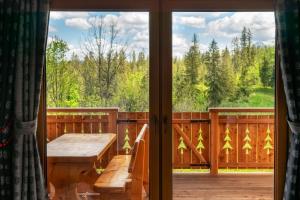 Balkón alebo terasa v ubytovaní Domek Góralski Modrzewiowa Weranda