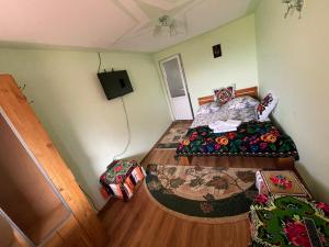 En eller flere senge i et værelse på Casa Marinca