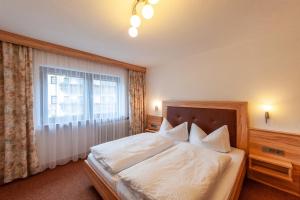 Posteľ alebo postele v izbe v ubytovaní Appartements Birkenhof