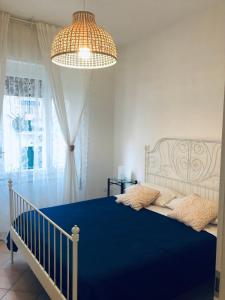 Posteľ alebo postele v izbe v ubytovaní Caio Asinio Apartment