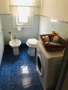 Kúpeľňa v ubytovaní Caio Asinio Apartment