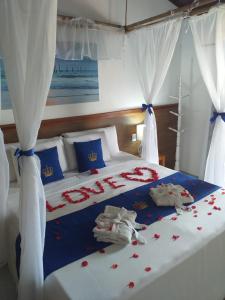 Cama ou camas em um quarto em Hotel Solar do Imperador