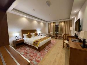 Katil atau katil-katil dalam bilik di Alsahwa Hotel