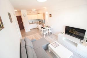 Kuchyňa alebo kuchynka v ubytovaní Apartamenty City Center - Zdrojowe