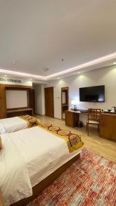 TV a/nebo společenská místnost v ubytování Alsahwa Hotel