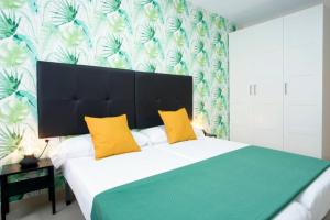 Posteľ alebo postele v izbe v ubytovaní Sweet Apartment