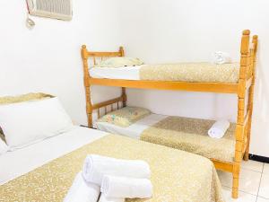 Postel nebo postele na pokoji v ubytování Pousada Marymar