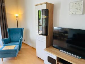 Apartament Szczecin Dunskaにあるテレビまたはエンターテインメントセンター