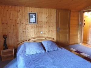 Llit o llits en una habitació de Le Si-près Pied des pistes