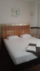 Кровать или кровати в номере Отель Старый город