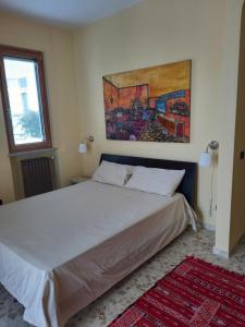 A bed or beds in a room at Confortevole