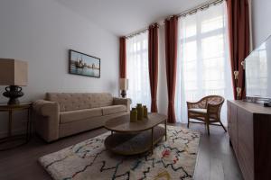 a living room with a couch and a table at Semaphore in Paris