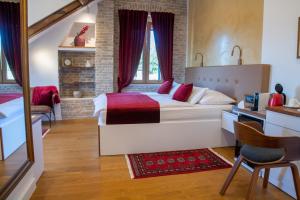 Posezení v ubytování Oblivion Luxury Rooms
