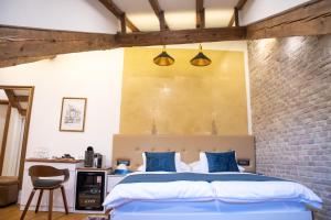Postel nebo postele na pokoji v ubytování Oblivion Luxury Rooms