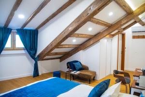 Postel nebo postele na pokoji v ubytování Oblivion Luxury Rooms