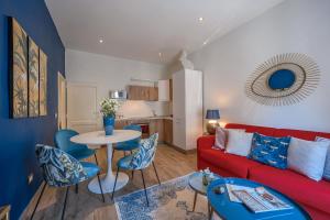 A kitchen or kitchenette at Via Macci, 59 - Florence Charming Apartments - Stylish apartments in a vibrant neighborhood with so comfortable beds!