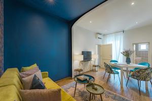 A seating area at Via Macci, 59 - Florence Charming Apartments - Stylish apartments in a vibrant neighborhood with so comfortable beds!
