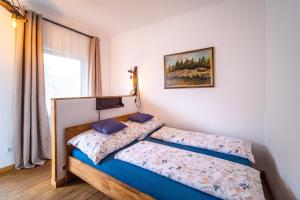 Posteľ alebo postele v izbe v ubytovaní Villa Theresienhof