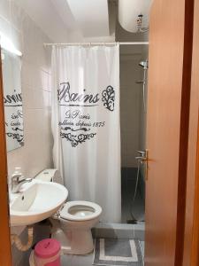 Koupelna v ubytování MPOZA APPARTMENTS