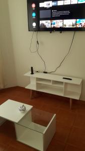 TV a/nebo společenská místnost v ubytování Hermoso departamento en chorrillos + 5 fotografií