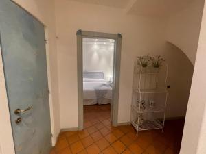 A bed or beds in a room at Villa Soprana by Agenzia SolturElba