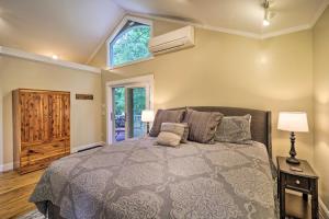 a bedroom with a bed and a window at Quiet Studio Escape about 2 Mi to Blue Ridge Parkway! in West Jefferson