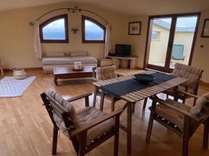 A seating area at Villa Soprana by Agenzia SolturElba
