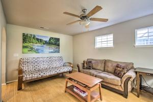 a living room with a couch and a ceiling fan at Riverbend Park Retreat 3 mi from OSU and Downtown in Corvallis