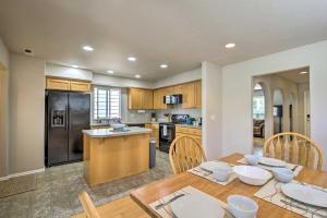 a kitchen and dining room with a table and chairs at Riverbend Park Retreat 3 mi from OSU and Downtown in Corvallis